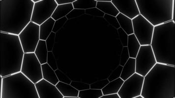 Dark virtual tunnel with neon hexagonal grid. Design. Bright neon grid of hexagons in circular tunnel. Round tunnel with hexagonal grid on black background video