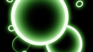 Neon 3d balls move in spiral in space. Design. Glowing rings with the shape of 3d ball on black background. Glowing balls move in dizzying spiral flow in space video