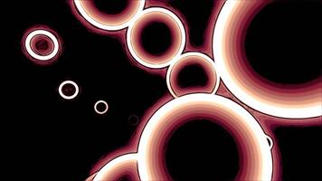 Black background with flying bubbles. Design. Red and purple bubbles with neon lights made in cartoon abstraction. video