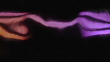 Abstract flickering colorful pattern of wavy stripes. Motion. Shining bending lines. video