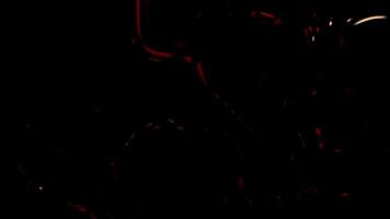 Abstract flickering red sparks on a black background. Motion. Shining red lines. video
