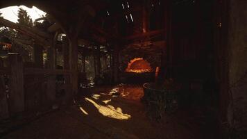 A rustic forge illuminated by warm light within an old workshop video