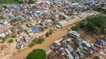 Aerial view of the local village in Tachileik the border town between Thailand and Myanmar having damaged after typhoon Yagi has swept Southeast Asia. photo
