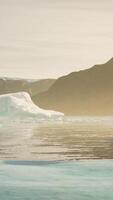 Antarctic iceberg landscape with glacier running into ocean video