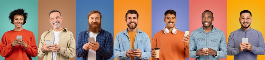 A diverse group of seven men stands in front of brightly colored backgrounds, each engaged with their smartphones photo