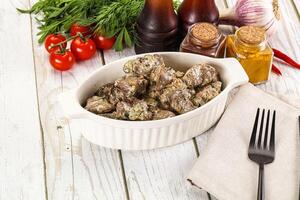 Roasted chicken liver with cream photo