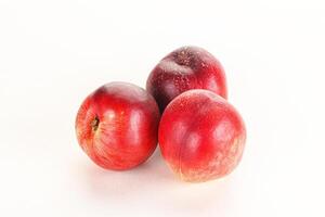 Ripe sweet juicy nectarines heap photo