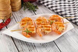 Grilled king prawn skewer snack photo