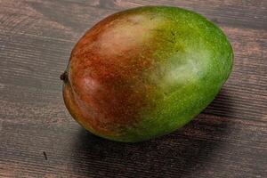 Sweet juicy green and red mango photo