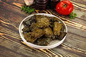 Stuffed dolma - meat in grape leaves photo