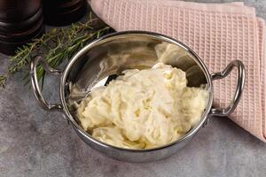 Italian soft young cheese stracciatella photo