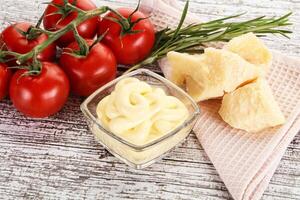 Cheese sauce in the bowl photo