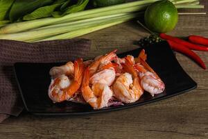Shrimp cocktail with salad and sauce photo