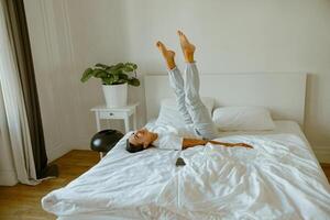 Experience a Relaxing and Refreshing Morning Routine in the Comfort of a Cozy Bedroom Space photo