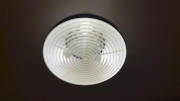 Blurry abstract background of a of Modern Ceiling lamp. Defocused photo background. Perfect for background, design element, or any commercial