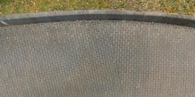 top view of surface of pedestrian path with paving slabs photo