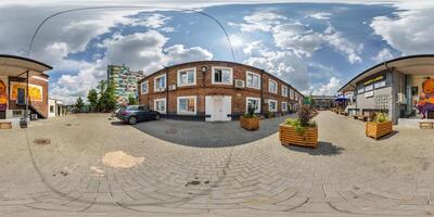 360 hdri panorama on street in courtyard or backyard of city bystreet with graffiti on walls in equirectangular projection, ready for VR AR virtual reality content photo