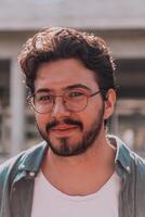 A portrait of a modern man, exuding confidence and style, against an outdoor backdrop, showcasing his charisma and fashionable demeanor. photo