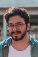 A portrait of a modern man, exuding confidence and style, against an outdoor backdrop, showcasing his charisma and fashionable demeanor. photo