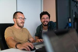 Programmers engrossed in deep collaboration, diligently working together to solve complex problems and develop innovative mobile applications with seamless functionality. photo
