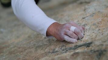 A Serene Moment of Reflection. A Person Holding a Precious Object on a Majestic Rocky Outcrop video