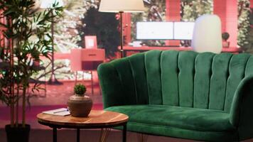 Empty professional psychotherapy office with a modern couch and furniture, creating a cozy safe feeling for customers to open up about their problems. High end luxurious counseling cabinet. video