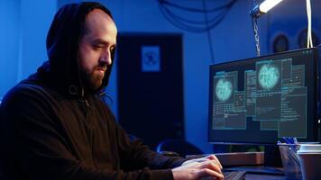 Hacker excited after finally developing zero day exploit undetectable by antivirus software installed on systems. Rogue programmer happy to successfully trick firewalls, celebrating accomplishment video