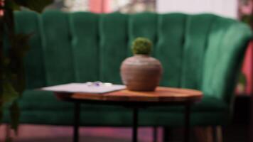 Empty therapist office with modern furniture and decorations to create a safe space for the customers, comfortable atmosphere. High end psychiatry cabinet used for counselling sessions. video
