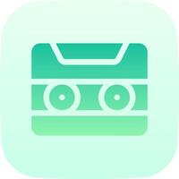 A green and white icon with a cassette tape vector
