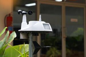 Weather station with wireless temperature and humidity gauge, rain gauge, anemometer, real-time weather updates with 8-channel sensor system. photo