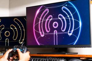 Gaming with Wireless Controller and Neon Wu-F Symbol photo