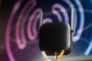 Black Router with Antennas and Abstract Background photo