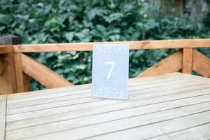 table number in cafe, as marker, table number, table number in the restaurant, number 7. the QR code for payment, looks chic, compact, suitable for restaurants, coffee shops photo