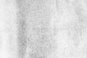 scanned paper, Halftone faded gradient texture. Grunge halftone grit background. White and black sand noise effect overlay photo