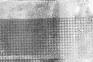 scanned paper, Halftone faded gradient texture. Grunge halftone grit background. White and black sand noise effect overlay photo