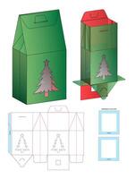 A christmas tree is shown in a box and a paper template vector