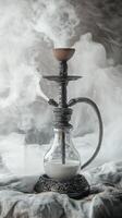 Traditional hookah with smoke on textured fabric, artistic mood photo