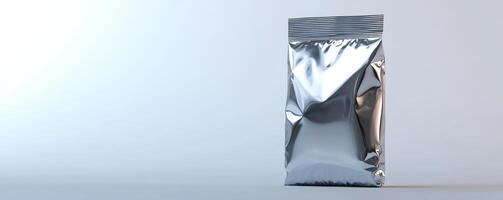 Silver foil pouch on white background, minimal design. Modern product packaging concept photo
