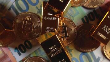 Shiny Gold Bars with Bitcoin on the 100 Euro Bills - Top View. Euro Money Currency. Hundred Euro Banknotes. Success, Finances, Cryptocurrency and Wealth Concept - Rotation Left video