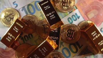 Shiny Gold Bars with Bitcoin on the 100 Euro Bills - Top View. Euro Money Currency. Hundred Euro Banknotes. Success, Finances, Cryptocurrency and Wealth Concept - Rotation Right video
