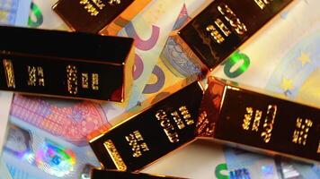 Shiny Gold Bars on the 20 Euro Bills - Top View. Euro Money Currency. A Lot of Twenty Euro Banknotes. Success, Finances and Wealth Concept - Rotation Right video