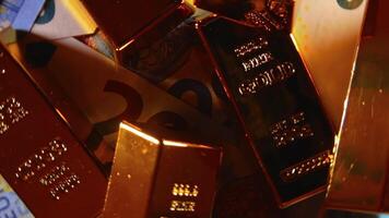 Shiny Gold Bars on the 20 Euro Bills - Top View. Euro Money Currency. A Lot of Twenty Euro Banknotes. Success, Finances and Wealth Concept - Rotation Right video