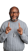 Smiling man in grey sweater making OK hand gesture on transparent background, cheerful expression png