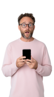 Man in pink sweater with shocked expression holding smartphone on transparent background png