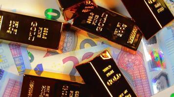 Shiny Gold Bars on the 20 Euro Bills - Top View. Euro Money Currency. A Lot of Twenty Euro Banknotes. Success, Finances and Wealth Concept - Slow Rotation Left video