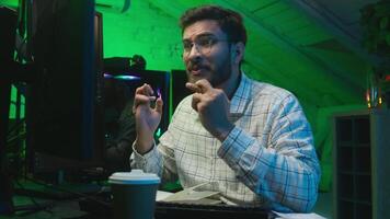 Caucasian man programmer gamer making wish crosses fingers for good luck ask for victory male guy software specialist looking at computer screen overjoyed winning rejoicing celebrating success win video
