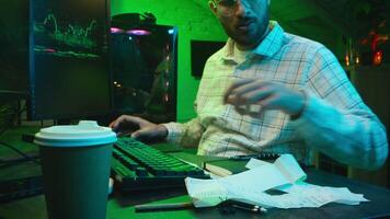 Focused Caucasian man programmer cyber security specialist coder checking coding looking screen male guy software engineer create software solving problem on computer IT support developing application video