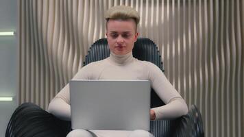 Caucasian woman girl in white neon futuristic space female IT programmer hacker coder gamer hacker software computer tech support typing laptop addict modern virtual reality play online game metaverse video