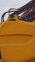 Combine harvests wheat on field. Combine harvester machine harvesting ripe wheat crops Vertical video