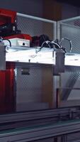 Modern innovative factory. Distribution of solar elements on the conveyor Vertical video